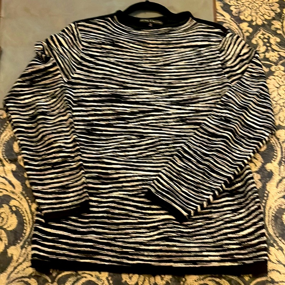 Black, white, gray, sweater.